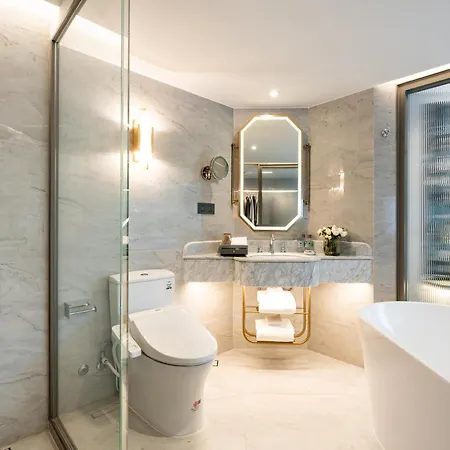 The Salil Hotel Riverside Bangkok Exterior photo Bathroom